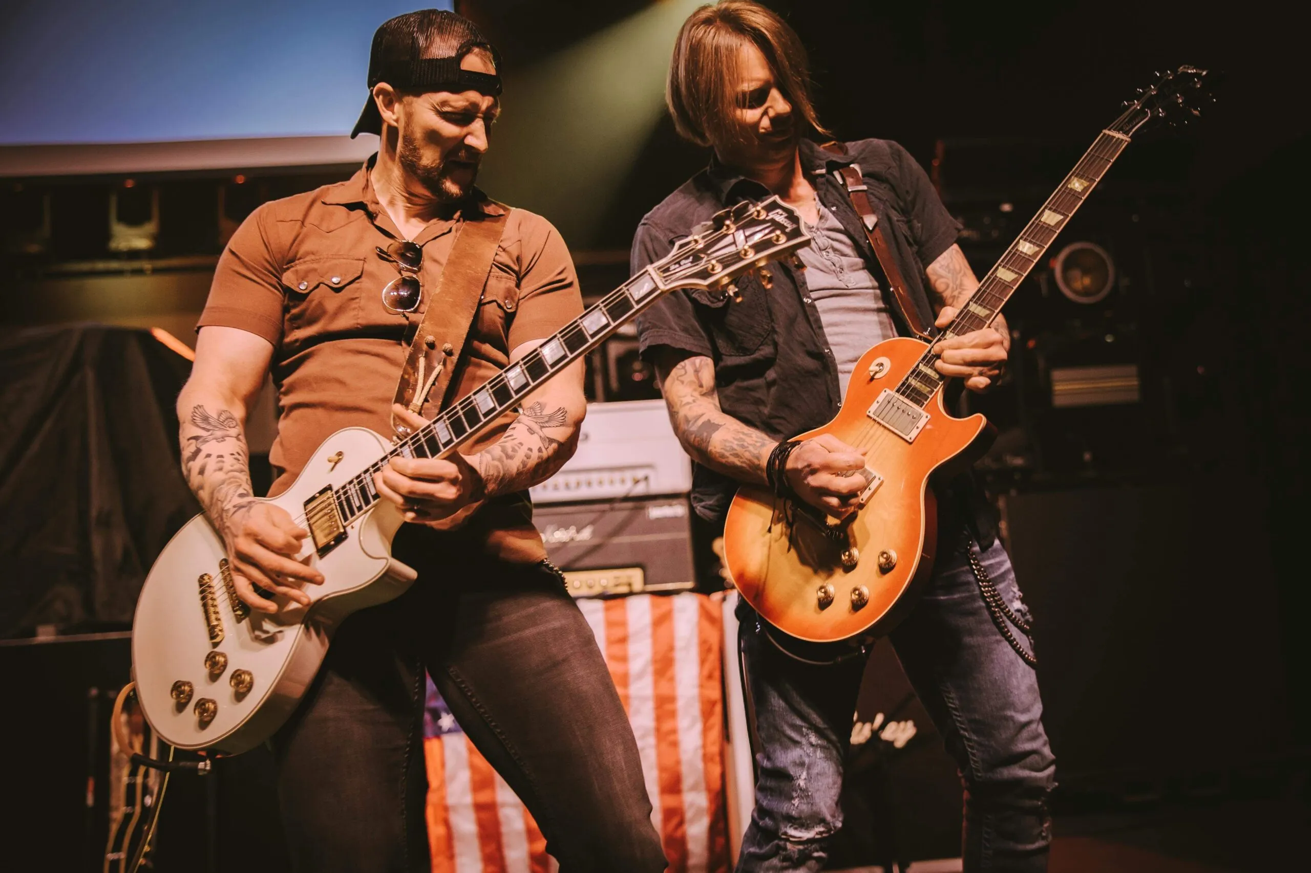 Jason Haven playing guitar with Collin Donely