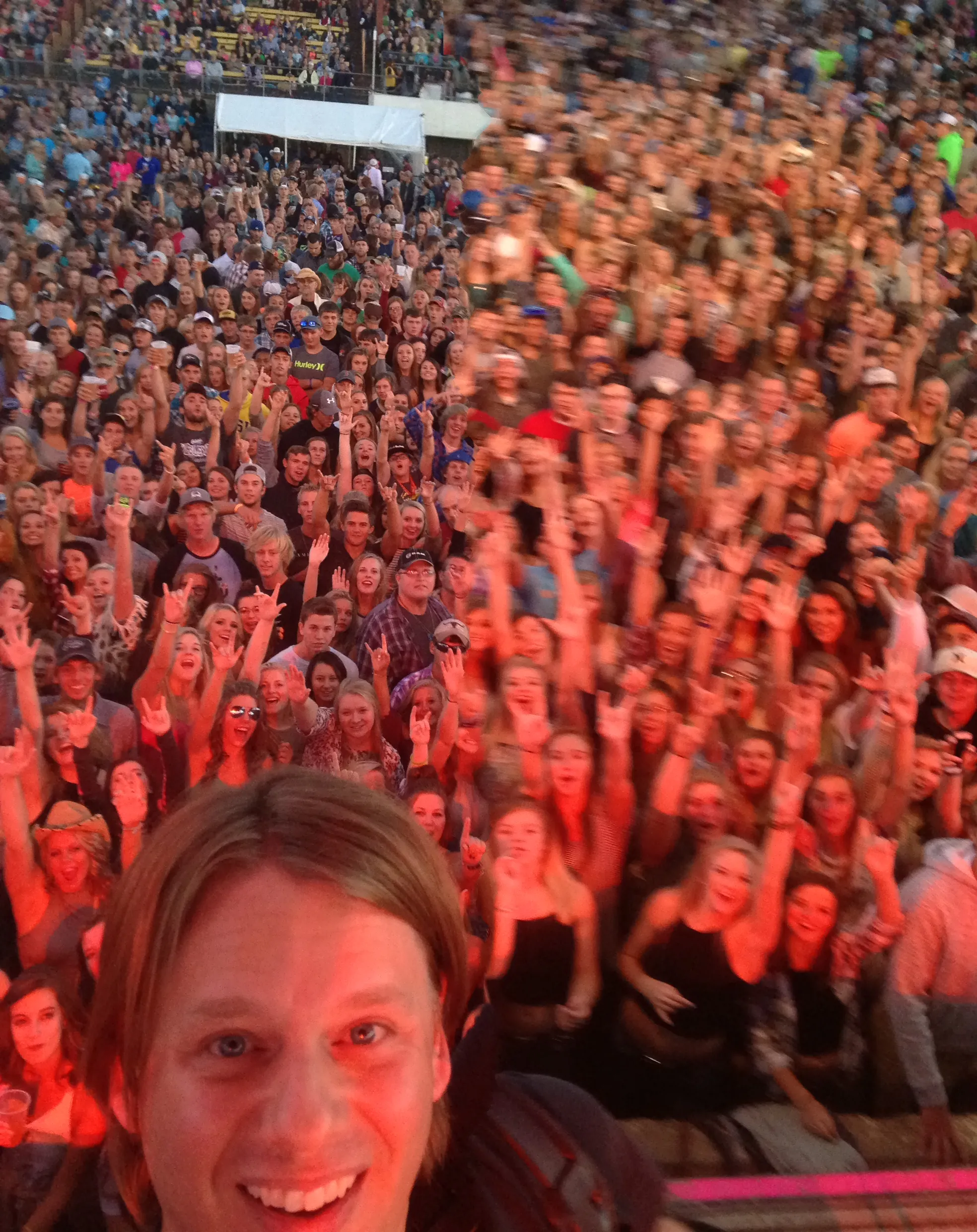 Jason Haven playing guitar with a crowd of people