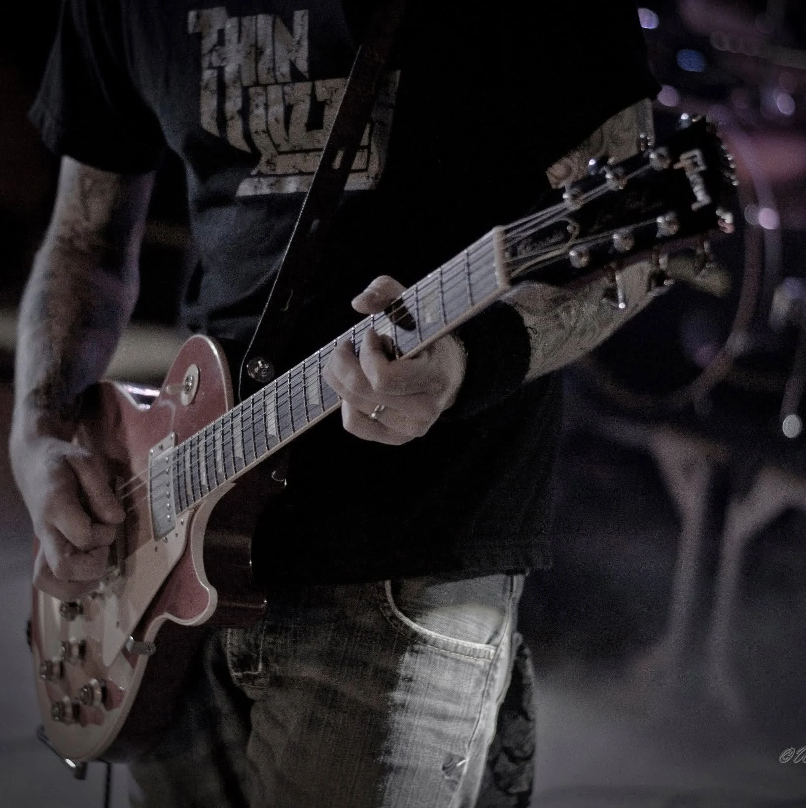 Jason Haven playing a Gibson Les Paul onstage